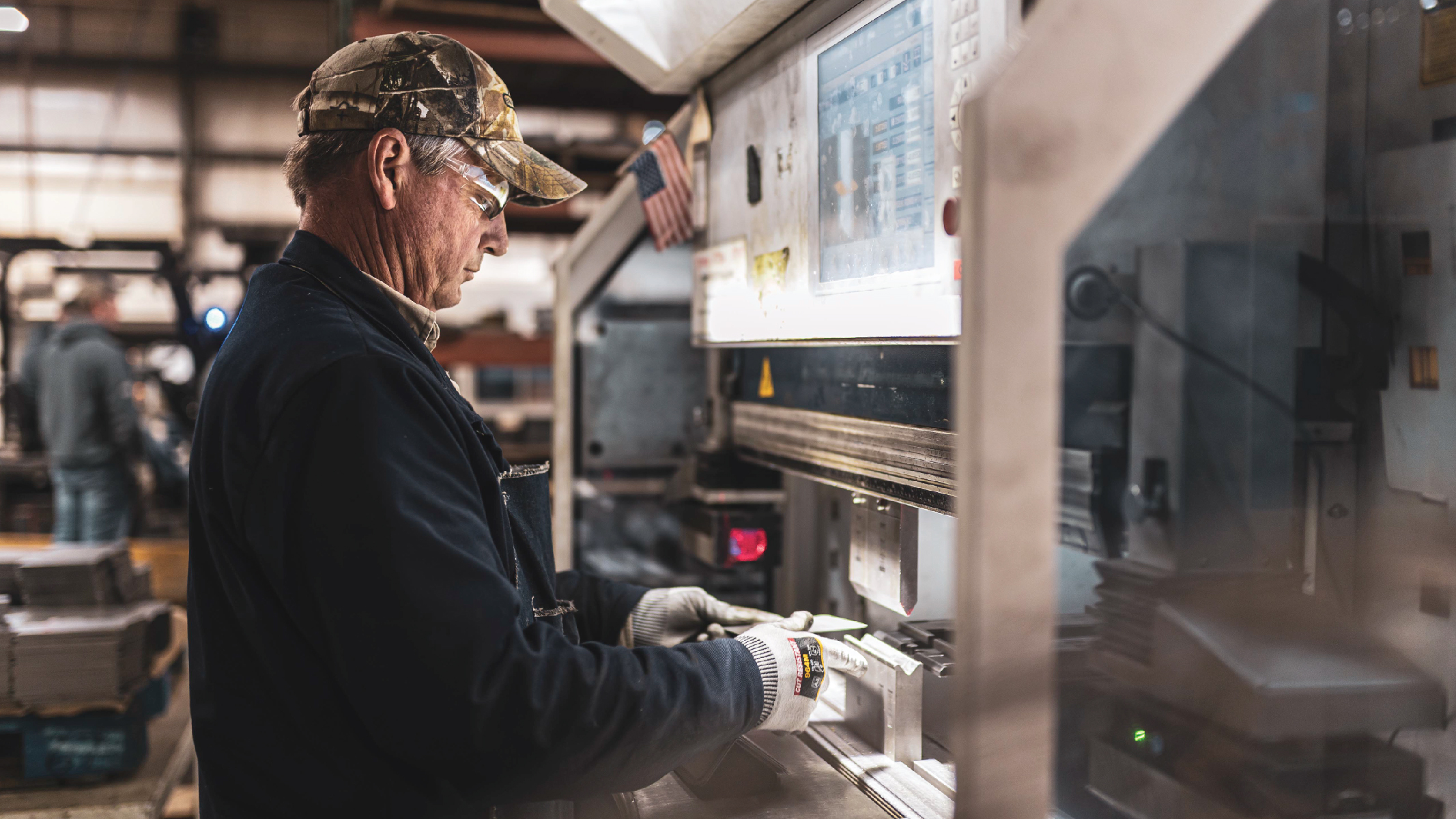 Allmand factory worker